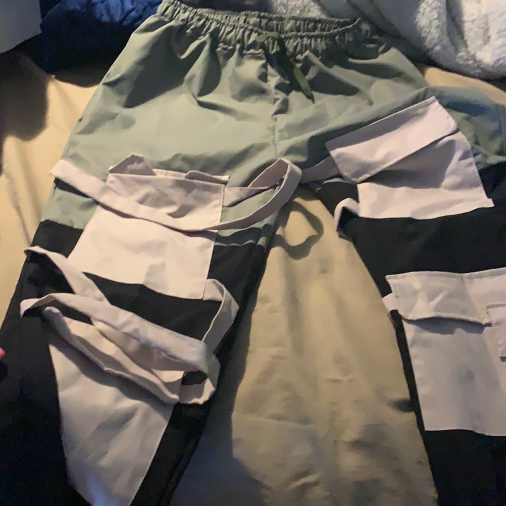 BLACK GREEN AND TAN PANTS